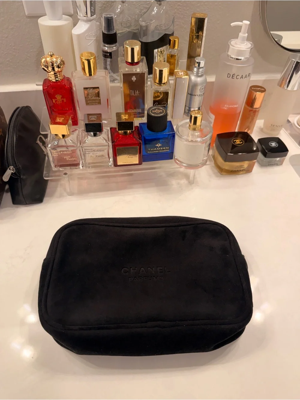 CHANEL Black Suede Cosmetic Pouch with Embossed Logo